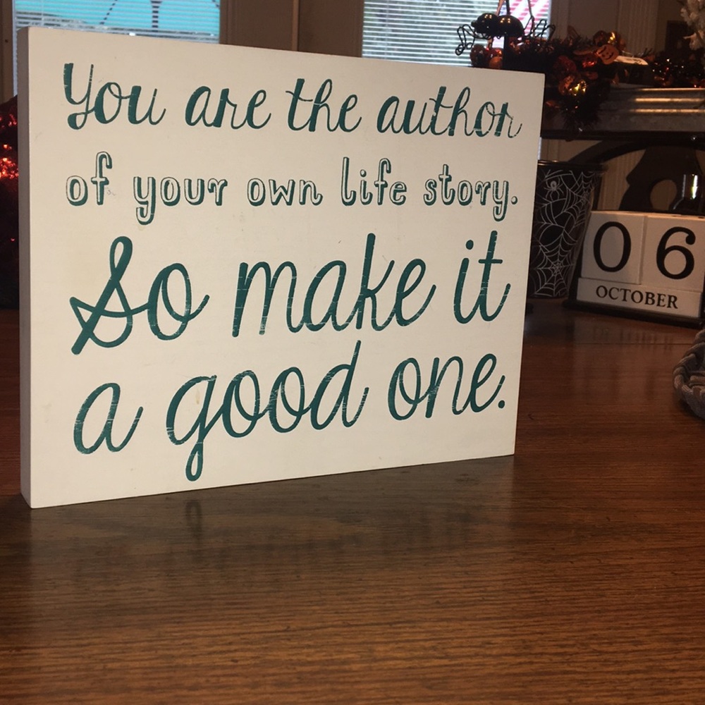 White Wooden plaque with turquoise words